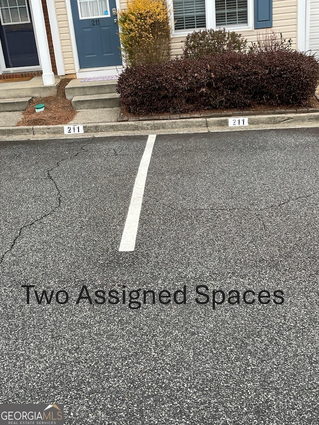 211 Buckland Dr, Alpharetta, GA 30022 - uncovered parking lot with entry steps
