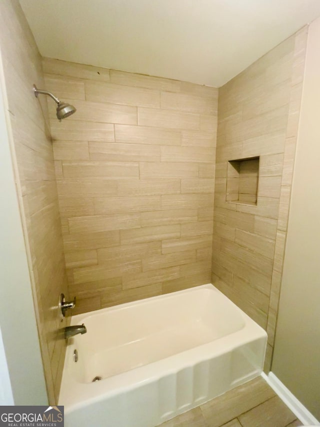 2502 Barge Rd SW, Atlanta, GA 30331 - bathroom with baseboards and bathing tub / shower combination