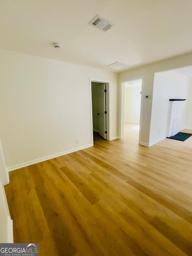 2502 Barge Rd SW, Atlanta, GA 30331 - spare room with light wood-style floors, baseboards, and visible vents