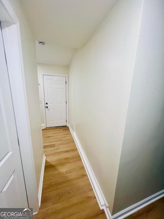 2502 Barge Rd SW, Atlanta, GA 30331 - hall featuring baseboards and light wood-style flooring