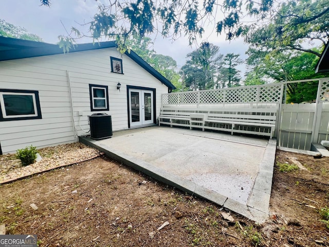 2502 Barge Rd SW, Atlanta, GA 30331 - view of patio with french doors, fence, and central AC unit