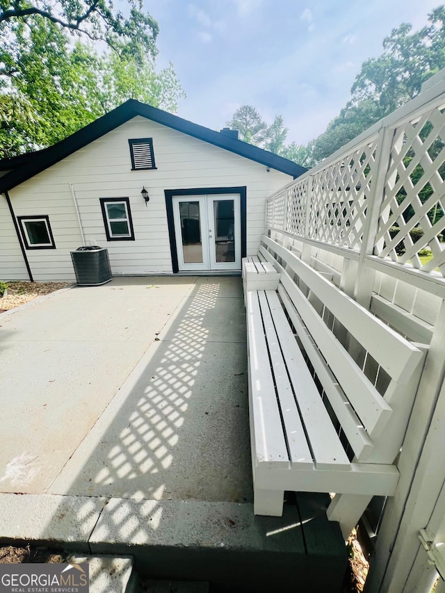 2502 Barge Rd SW, Atlanta, GA 30331 - back of property with central air condition unit and french doors