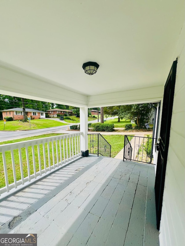 2502 Barge Rd SW, Atlanta, GA 30331 - wooden terrace with a porch and a yard