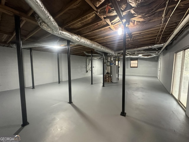 below grade area featuring water heater