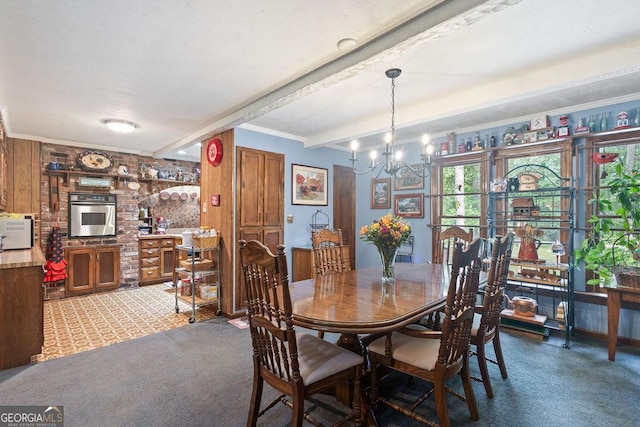 dining room featuring carpet, beam ceiling, and a chandelier