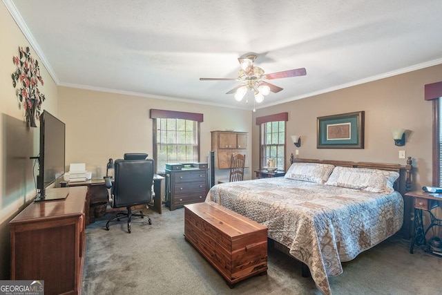 bedroom with crown molding, carpet flooring, and multiple windows
