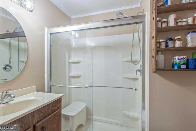 full bath featuring toilet, ornamental molding, a shower stall, and vanity