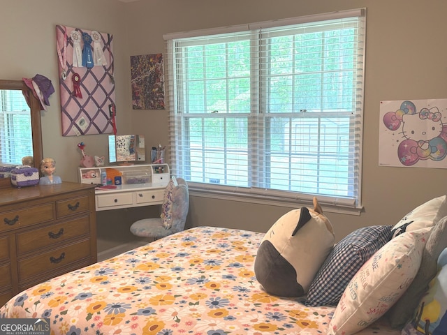 bedroom with multiple windows
