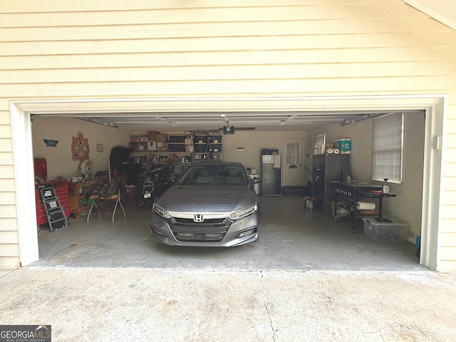 garage featuring driveway