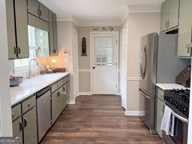 kitchen featuring a sink, light countertops, stainless steel appliances, and dark wood-type flooring