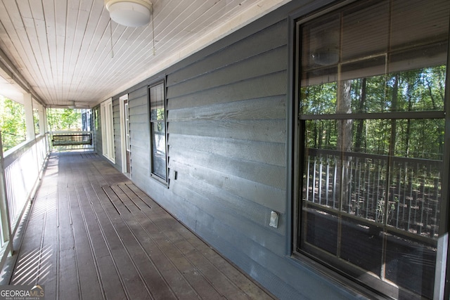 wooden terrace with covered porch