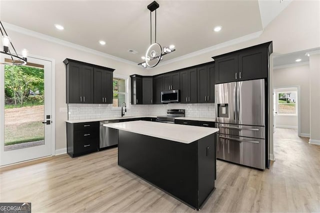 346 Chandler Ct, Alto, GA 30510 - kitchen with an inviting chandelier, dark cabinetry, and appliances with stainless steel finishes