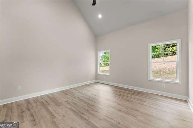 346 Chandler Ct, Alto, GA 30510 - spare room featuring baseboards, a ceiling fan, light wood-style flooring, and high vaulted ceiling