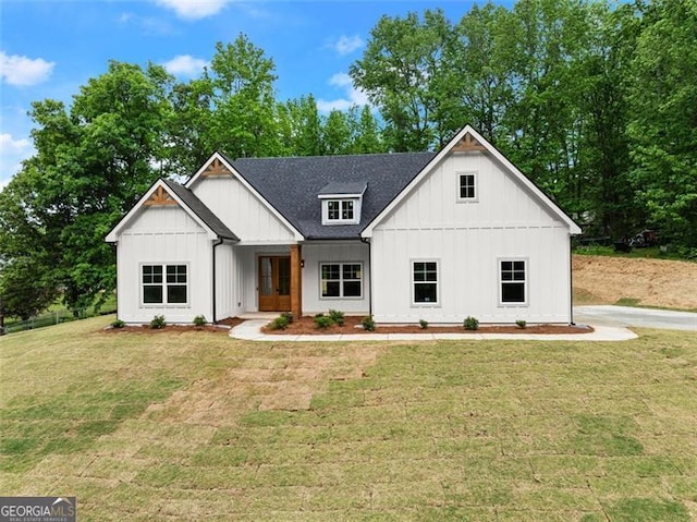 346 Chandler Ct, Alto, GA 30510 - modern inspired farmhouse with board and batten siding, roof with shingles, french doors, and a front yard
