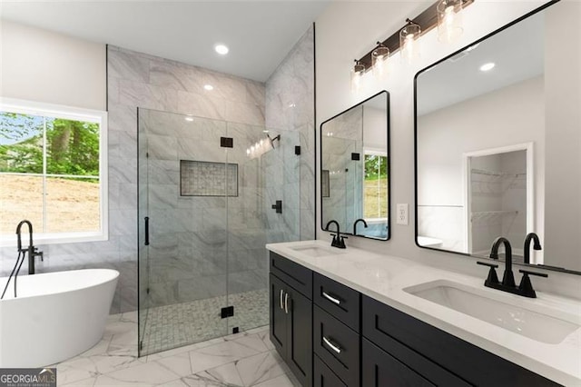 346 Chandler Ct, Alto, GA 30510 - bathroom featuring double vanity, a sink, marble finish floor, and a stall shower