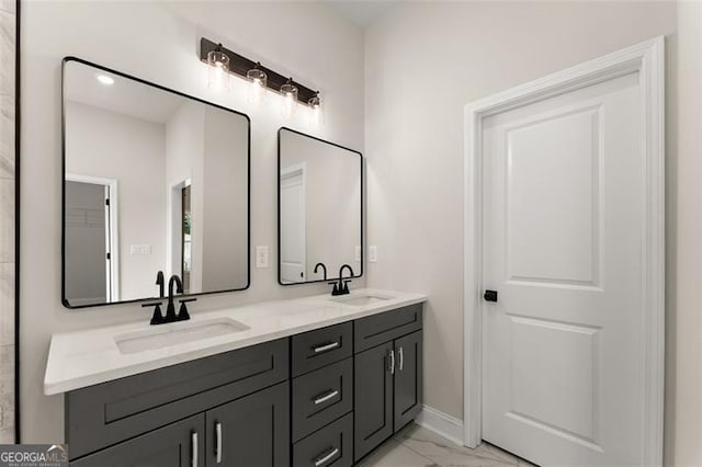 346 Chandler Ct, Alto, GA 30510 - bathroom with double vanity, baseboards, a sink, and marble finish floor