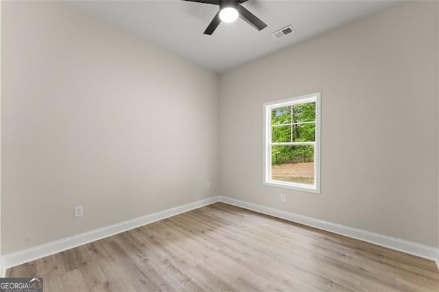 346 Chandler Ct, Alto, GA 30510 - empty room featuring visible vents, light wood-style flooring, ceiling fan, and baseboards