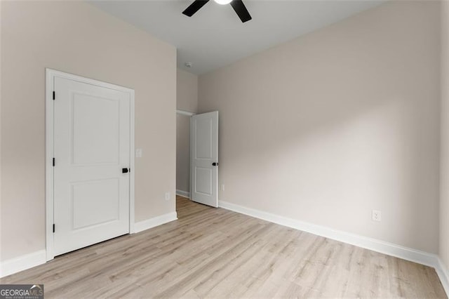346 Chandler Ct, Alto, GA 30510 - unfurnished bedroom with light wood-style floors, baseboards, and ceiling fan