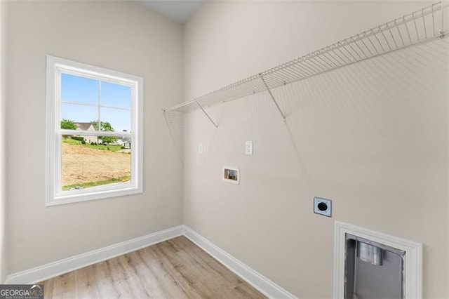 346 Chandler Ct, Alto, GA 30510 - laundry area with laundry area, baseboards, hookup for a washing machine, light wood-type flooring, and electric dryer hookup