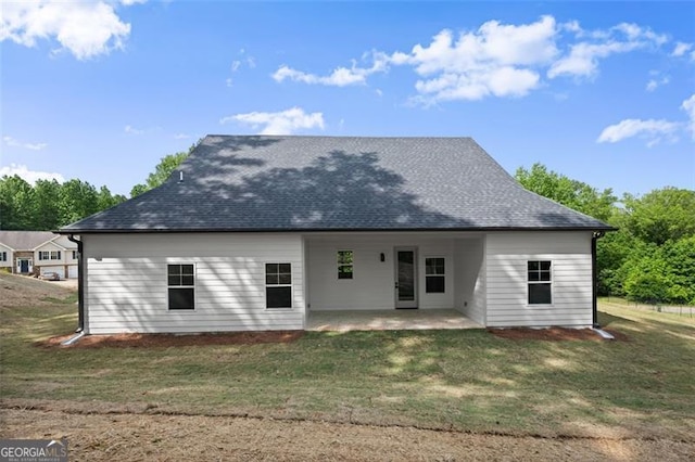 346 Chandler Ct, Alto, GA 30510 - rear view of house featuring a lawn, a shingled roof, and a patio area