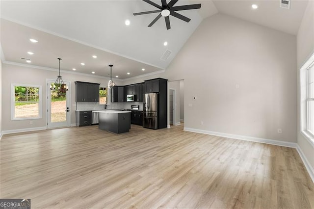 346 Chandler Ct, Alto, GA 30510 - kitchen with ceiling fan with notable chandelier, a kitchen island, stainless steel appliances, and open floor plan