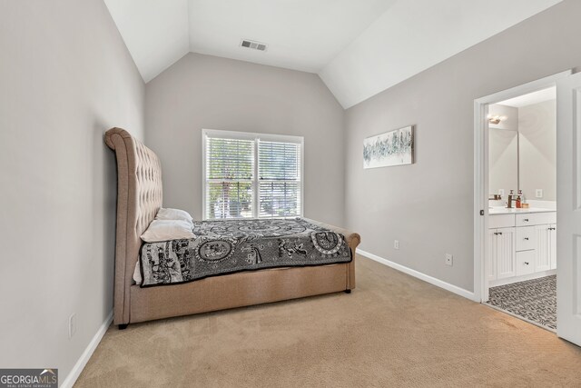 1584 Heartland Path, Hoschton, GA 30548 - bedroom featuring light colored carpet, a dry bar, lofted ceiling, and ensuite bath