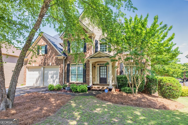 1584 Heartland Path, Hoschton, GA 30548 - traditional-style home with driveway and brick siding