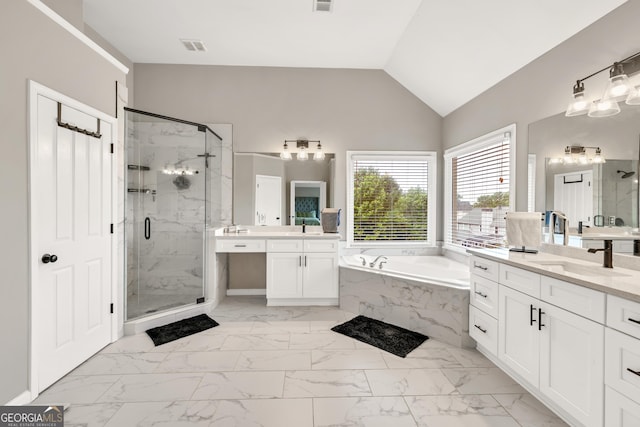 1584 Heartland Path, Hoschton, GA 30548 - full bathroom featuring a marble finish shower, marble finish flooring, a garden tub, two vanities, and lofted ceiling