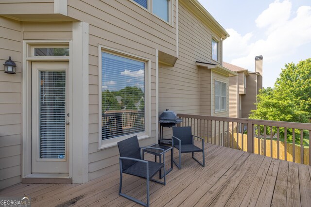 1584 Heartland Path, Hoschton, GA 30548 - wooden terrace with grilling area