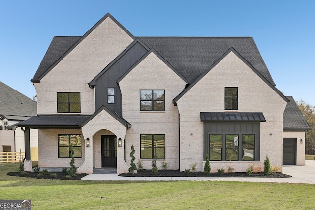 view of front of property with roof with shingles, brick siding, fence, a front lawn, and concrete driveway