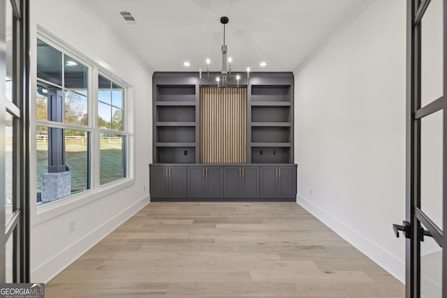 unfurnished dining area featuring an inviting chandelier, recessed lighting, baseboards, visible vents, and ornamental molding