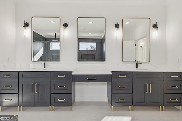 full bath with vanity, walk in shower, and tile patterned floors
