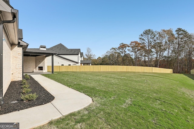 view of yard featuring fence