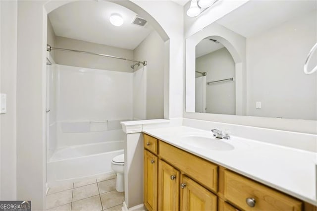 7712 Soaring Eagle Dr, Flowery Branch, GA 30542 - bathroom featuring tile patterned floors, vanity, and  shower combination