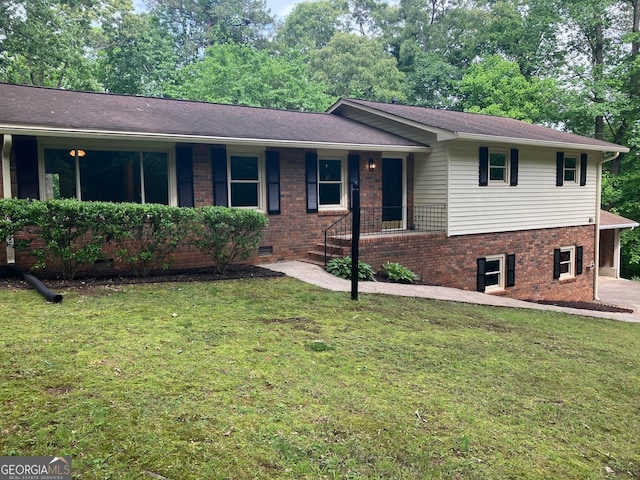 view of front of house with a porch, brick siding, crawl space, and a front lawn
