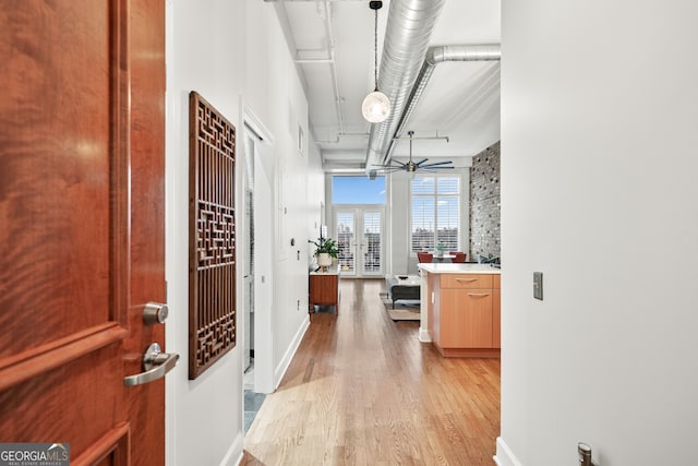 3820 Roswell Rd NE Unit 705, Atlanta, GA 30342 - hall featuring light wood finished floors and baseboards
