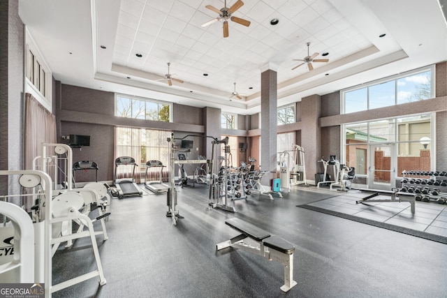3820 Roswell Rd NE Unit 705, Atlanta, GA 30342 - exercise room with a tray ceiling, a high ceiling, and a ceiling fan