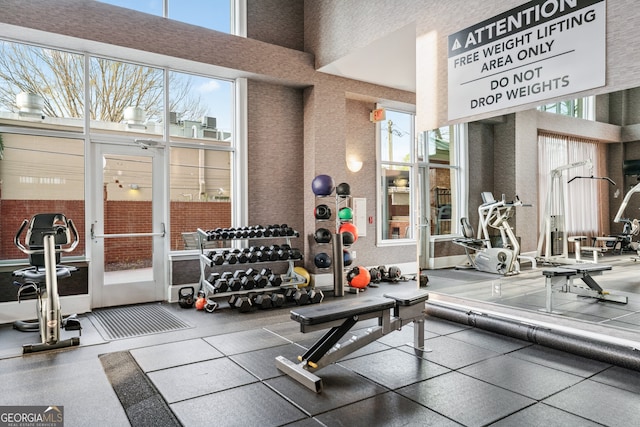 3820 Roswell Rd NE Unit 705, Atlanta, GA 30342 - workout area featuring a high ceiling