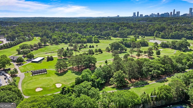 3820 Roswell Rd NE Unit 705, Atlanta, GA 30342 - drone / aerial view of a local golf course, skyline, and a nearby body of water