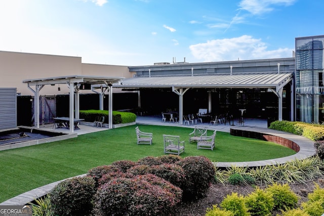 3820 Roswell Rd NE Unit 705, Atlanta, GA 30342 - view of green lawn with a patio area