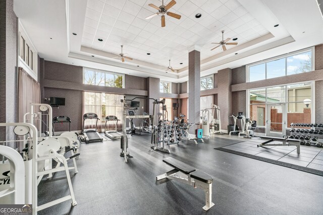 3820 Roswell Rd NE Unit 705, Atlanta, GA 30342 - exercise room featuring a raised ceiling, a towering ceiling, and a ceiling fan