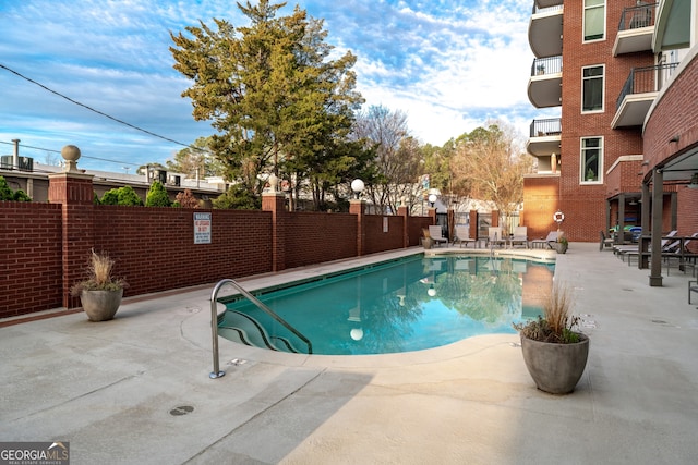 3820 Roswell Rd NE Unit 705, Atlanta, GA 30342 - community pool with a patio area