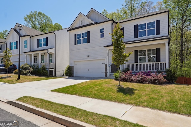 view of front of house with board and batten siding, a porch, a front yard, a garage, and concrete driveway