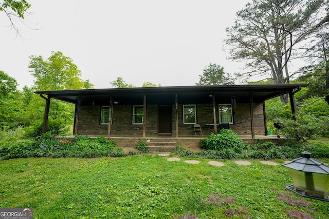 253 Dry Creek Rd, Cedartown, GA 30125 - view of front of property featuring a front yard, a porch, and brick siding
