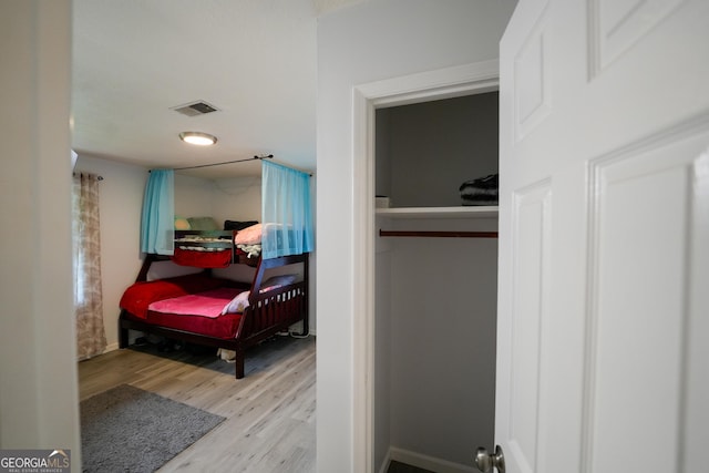 253 Dry Creek Rd, Cedartown, GA 30125 - bedroom with baseboards, wood finished floors, and visible vents