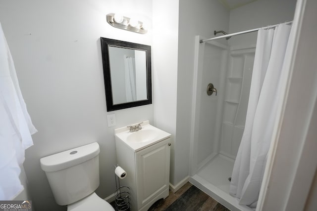 253 Dry Creek Rd, Cedartown, GA 30125 - bathroom featuring vanity, a stall shower, toilet, and wood finished floors