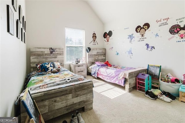 bedroom with carpet and vaulted ceiling