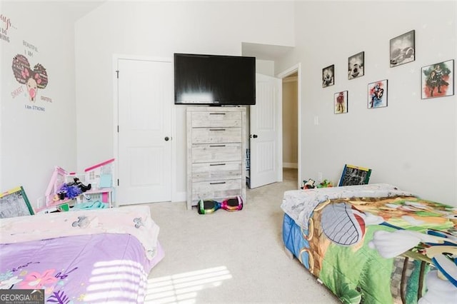 bedroom featuring carpet flooring