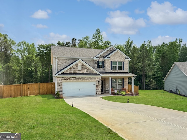 craftsman house featuring a porch, driveway, fence, a front lawn, and stone siding