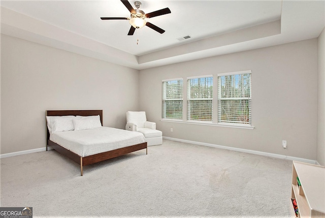 bedroom with baseboards, carpet flooring, and visible vents